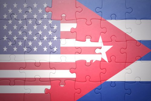 puzzle with the national flag of united states of america and cubaa